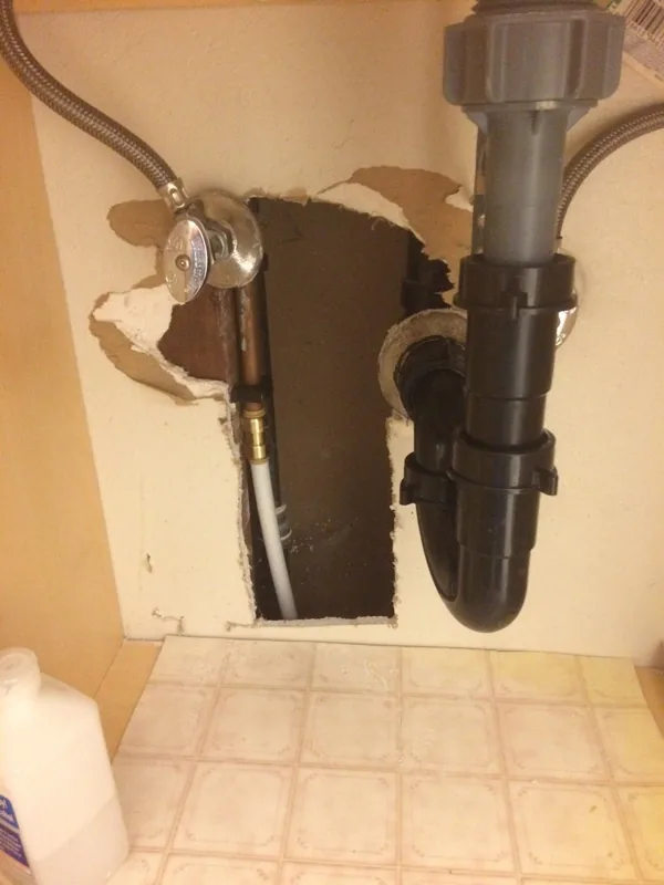 Drywall hole patched and textured