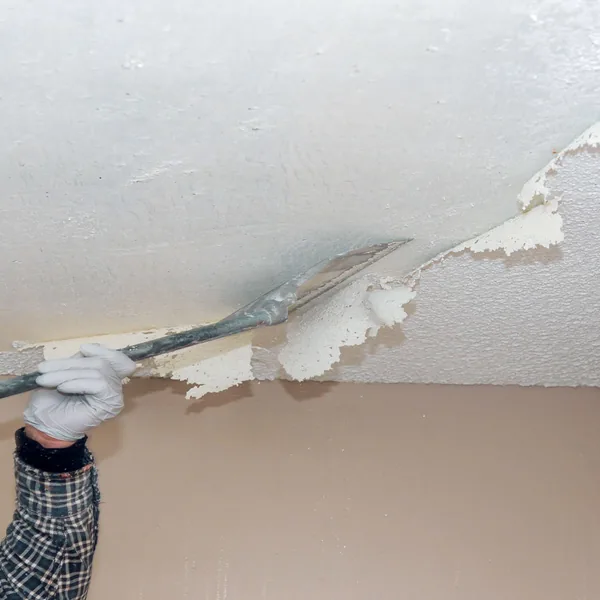 Popcorn ceiling scraped smooth
